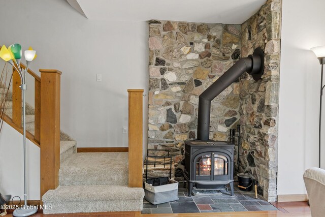 6175 Hawes Rd, Guilderland, NY 12009 - detailed view of a wood stove and baseboards