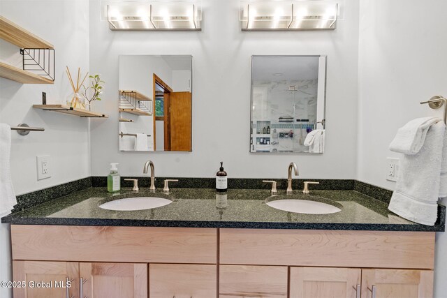 6175 Hawes Rd, Guilderland, NY 12009 - full bathroom featuring double vanity and a shower