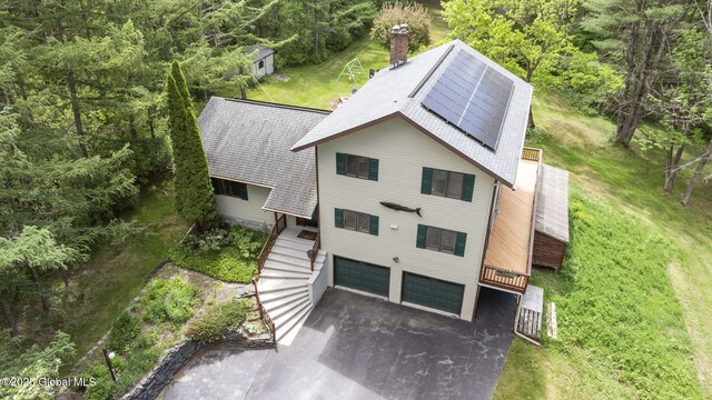 6175 Hawes Rd, Guilderland, NY 12009 - aerial view of property and surrounding area with a heavily wooded area