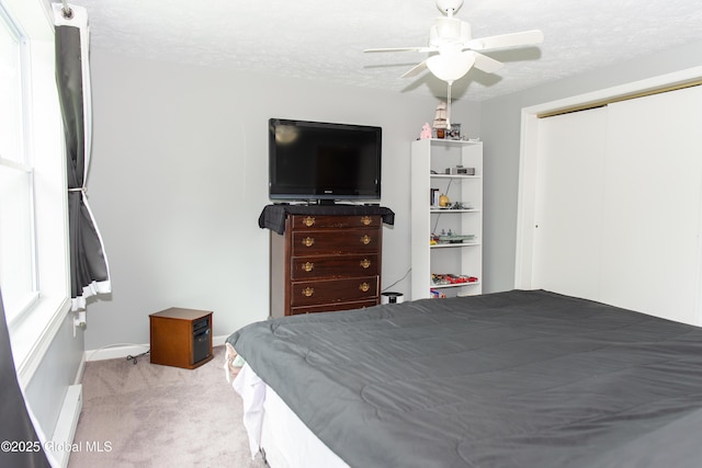 126 Hillside Rd, Duanesburg, NY 12137 - bedroom featuring carpet, a closet, a textured ceiling, and ceiling fan