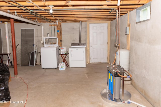 126 Hillside Rd, Duanesburg, NY 12137 - unfinished basement featuring independent washer and dryer and a water pressure tank