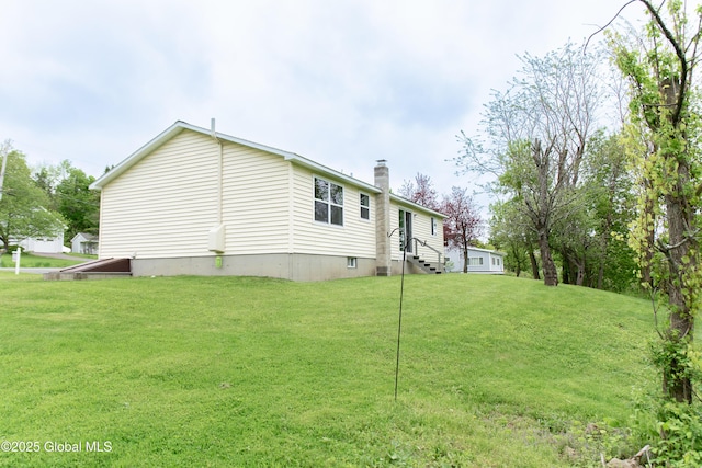126 Hillside Rd, Duanesburg, NY 12137 - view of side of home with a chimney and a lawn