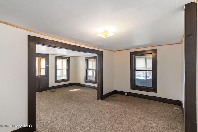 285 Main St, Worcester, NY 12197 - empty room with baseboards, carpet flooring, and ornamental molding