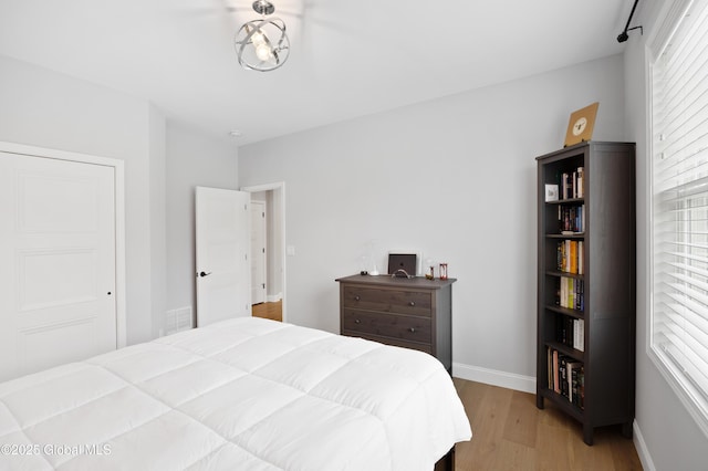 39 Berkeley Way, Wilton, NY 12866 - bedroom featuring light wood-type flooring and baseboards