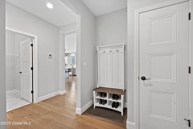 39 Berkeley Way, Wilton, NY 12866 - mudroom with light wood-type flooring and baseboards