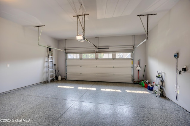 39 Berkeley Way, Wilton, NY 12866 - garage featuring a garage door opener