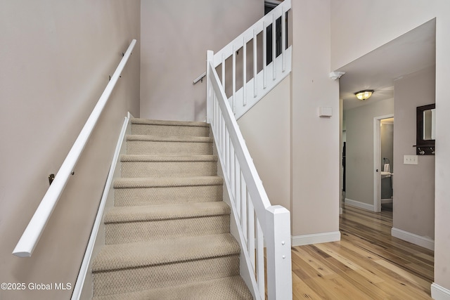 110 Deer Run Dr, Milton, NY 12020 - stairs featuring hardwood / wood-style floors and baseboards