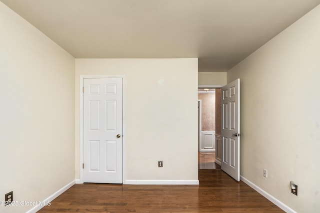 110 Deer Run Dr, Milton, NY 12020 - unfurnished bedroom featuring dark wood-type flooring and baseboards