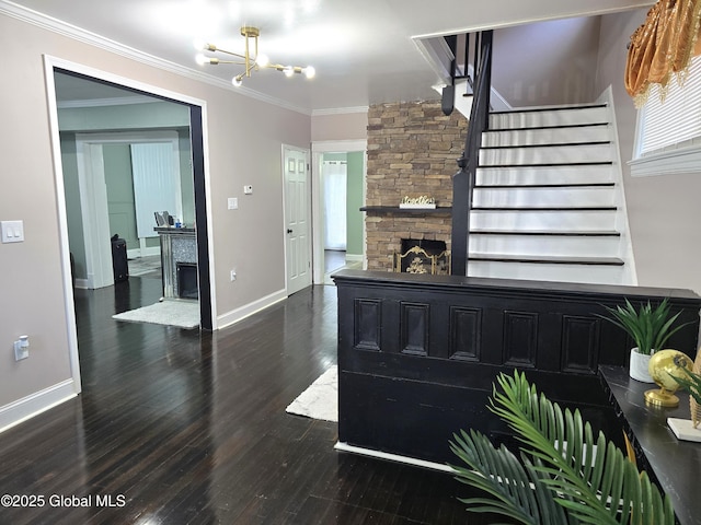 1117 Mcclellan St, Schenectady, NY 12309 - living area featuring a stone fireplace, stairs, a chandelier, baseboards, and crown molding