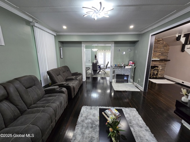 1117 Mcclellan St, Schenectady, NY 12309 - living room with a stone fireplace, crown molding, wood-type flooring, baseboards, and recessed lighting
