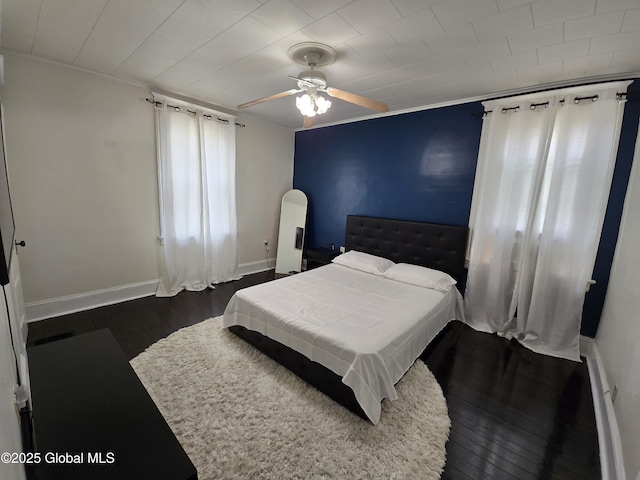 1117 Mcclellan St, Schenectady, NY 12309 - bedroom with dark wood-type flooring, baseboards, ceiling fan, and ornamental molding