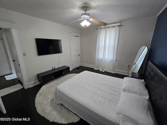 1117 Mcclellan St, Schenectady, NY 12309 - bedroom featuring ornamental molding, baseboards, a ceiling fan, and dark wood finished floors