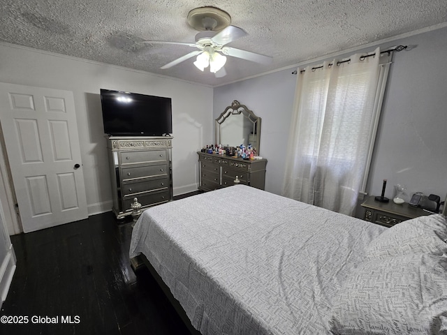 1117 Mcclellan St, Schenectady, NY 12309 - bedroom with crown molding, dark wood-style flooring, a textured ceiling, ceiling fan, and baseboards