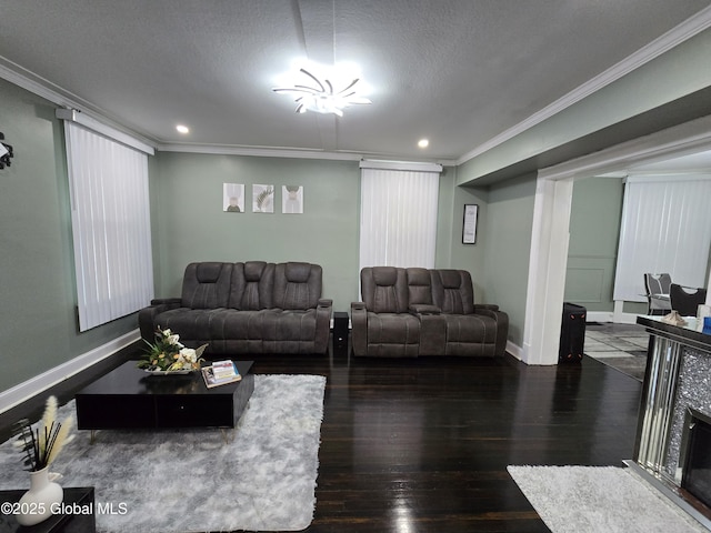 1117 Mcclellan St, Schenectady, NY 12309 - living room with ornamental molding, hardwood / wood-style flooring, recessed lighting, baseboards, and a textured ceiling