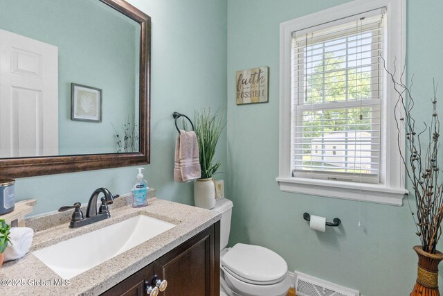 11 Lucille Ln, Malta, NY 12019 - bathroom with toilet and vanity