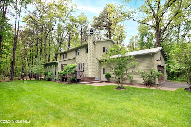 124 Edie Rd, Wilton, NY 12866 - back of property featuring a chimney, a wooden deck, and a lawn