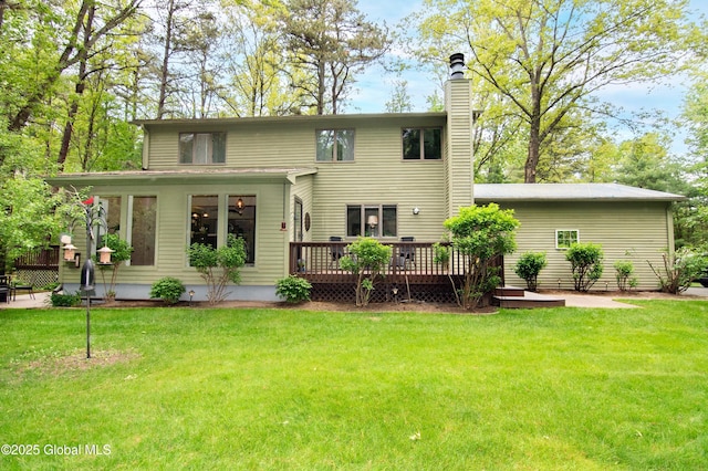 124 Edie Rd, Wilton, NY 12866 - rear view of house featuring a deck, a chimney, and a lawn