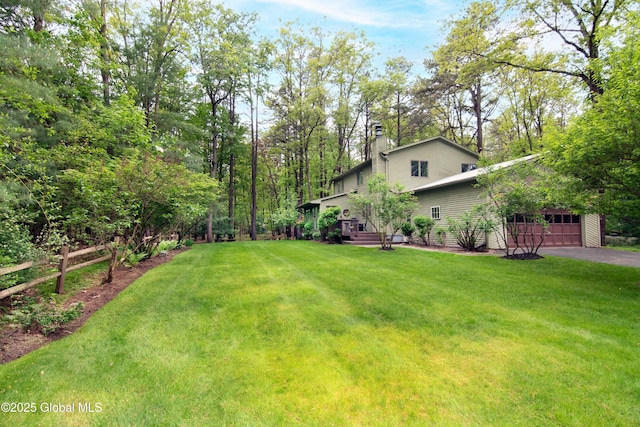 124 Edie Rd, Wilton, NY 12866 - view of grassy yard with asphalt driveway