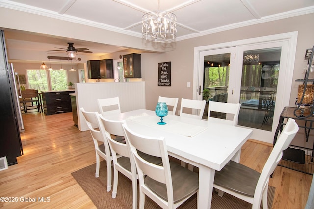 124 Edie Rd, Wilton, NY 12866 - dining space featuring light wood finished floors, a chandelier, crown molding, and ceiling fan