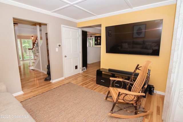 124 Edie Rd, Wilton, NY 12866 - sitting room featuring wood finished floors, stairs, and crown molding