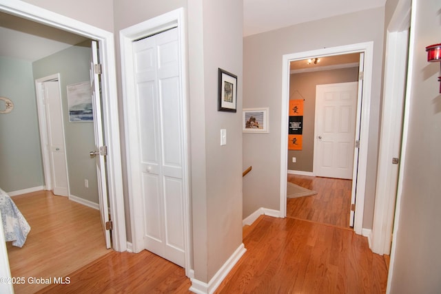 124 Edie Rd, Wilton, NY 12866 - corridor with light wood finished floors and an upstairs landing