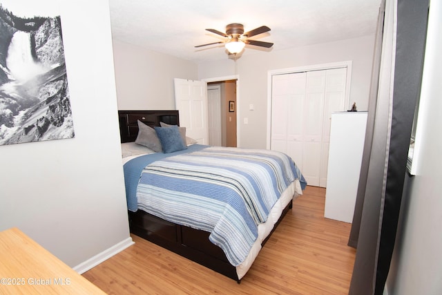 124 Edie Rd, Wilton, NY 12866 - bedroom with light wood-type flooring, a closet, and a ceiling fan