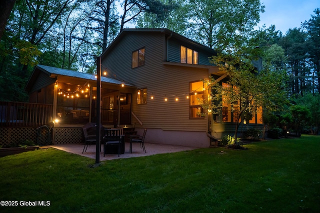 124 Edie Rd, Wilton, NY 12866 - rear view of property with a lawn, a patio area, a sunroom, and a deck