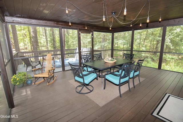 124 Edie Rd, Wilton, NY 12866 - sunroom / solarium with outdoor dining area, plenty of natural light, and a chandelier