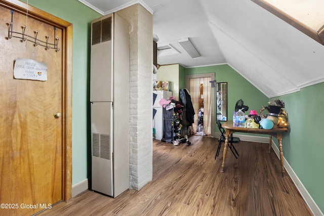 12 Mynderse St, Schenectady, NY 12307 - additional living space with a heating unit, wood finished floors, baseboards, and lofted ceiling