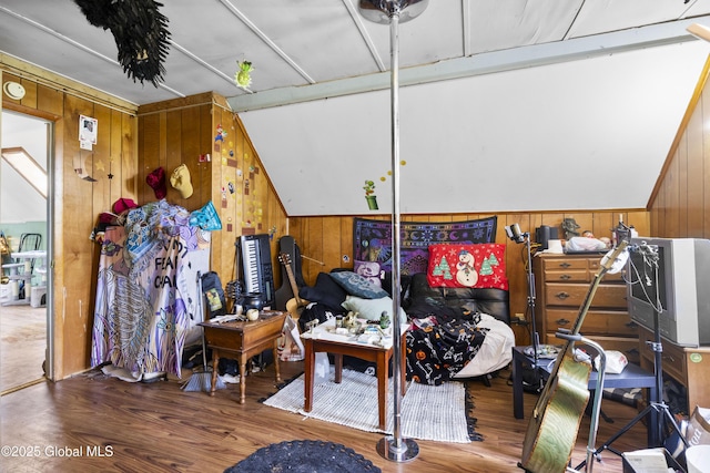 12 Mynderse St, Schenectady, NY 12307 - bedroom featuring wood walls, wood finished floors, and vaulted ceiling