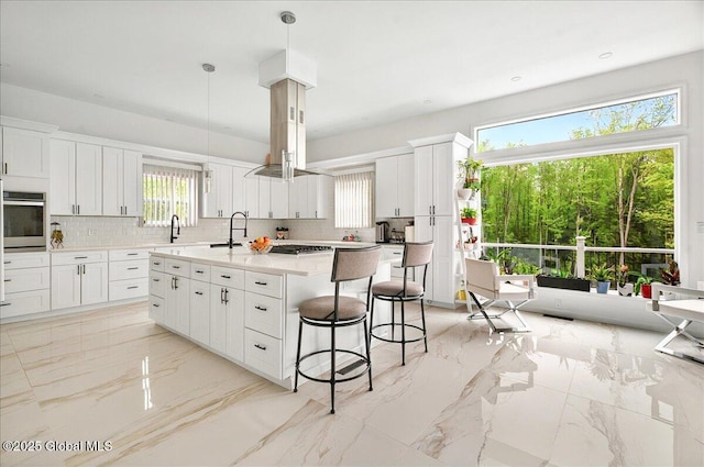 14 Calvin Cole Rd, Stephentown, NY 12169 - kitchen with stainless steel appliances, light marble finish floors, and decorative backsplash