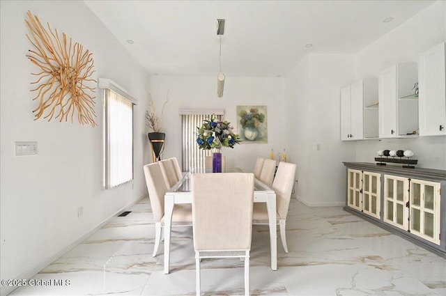 14 Calvin Cole Rd, Stephentown, NY 12169 - dining area with light marble finish flooring and baseboards