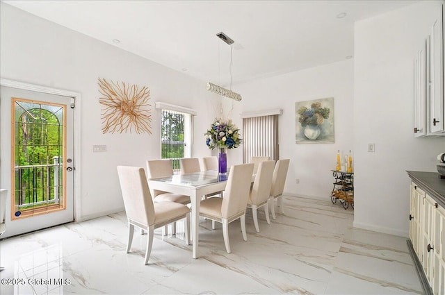 14 Calvin Cole Rd, Stephentown, NY 12169 - dining room featuring light marble finish floors and baseboards