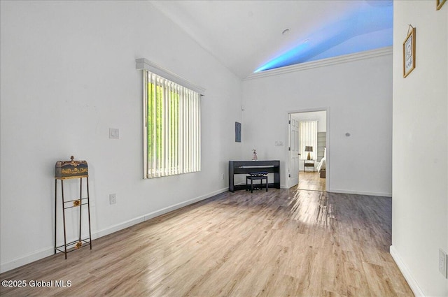 14 Calvin Cole Rd, Stephentown, NY 12169 - living area featuring wood finished floors, high vaulted ceiling, and baseboards