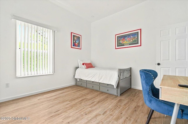 14 Calvin Cole Rd, Stephentown, NY 12169 - bedroom featuring wood finished floors, multiple windows, baseboards, and a desk
