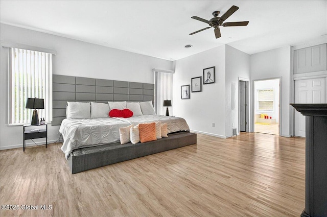 14 Calvin Cole Rd, Stephentown, NY 12169 - bedroom with multiple windows, light wood finished floors, and baseboards