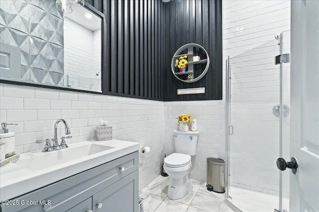 14 Calvin Cole Rd, Stephentown, NY 12169 - bathroom featuring a stall shower, marble finish flooring, vanity, toilet, and tile walls