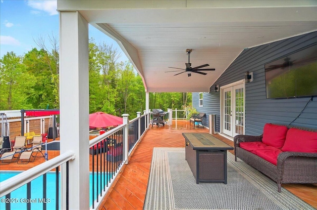 14 Calvin Cole Rd, Stephentown, NY 12169 - wooden deck featuring french doors, an outdoor hangout area, ceiling fan, and outdoor dining area