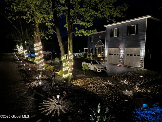 14 Calvin Cole Rd, Stephentown, NY 12169 - yard at twilight featuring concrete driveway and a garage