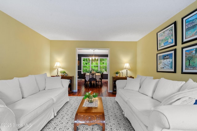 9 Longwood Dr, Saratoga Springs, Inside, NY 12866 - living room featuring wood finished floors and a chandelier