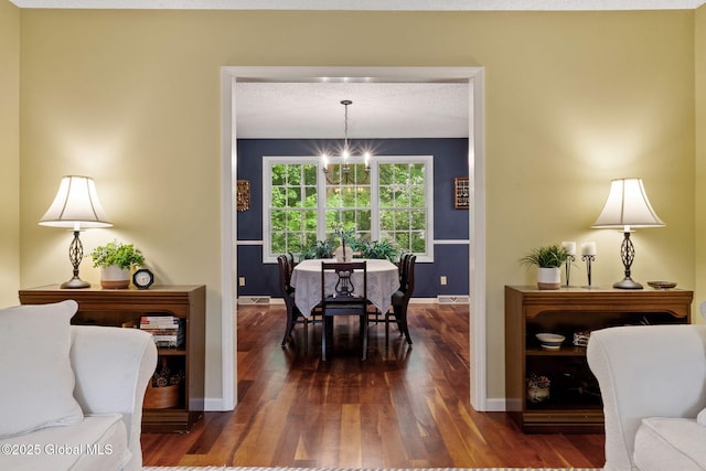 9 Longwood Dr, Saratoga Springs, Inside, NY 12866 - dining space with a chandelier and dark wood-style flooring
