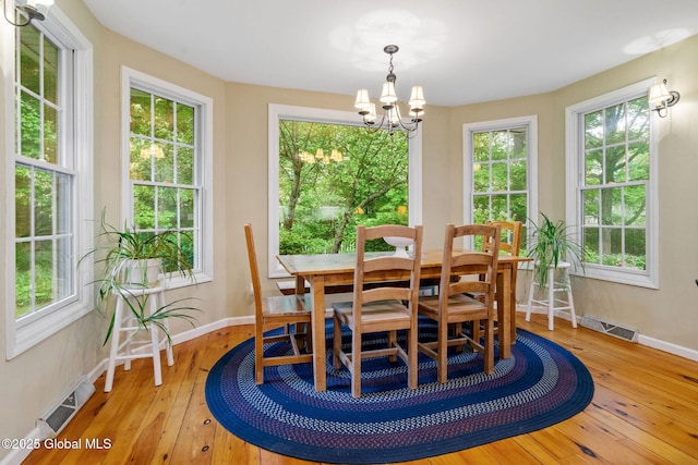 9 Longwood Dr, Saratoga Springs, Inside, NY 12866 - dining room with a chandelier, light wood finished floors, and plenty of natural light
