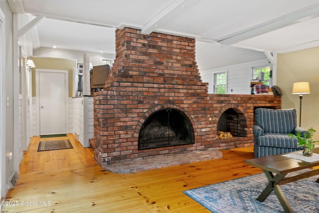 9 Longwood Dr, Saratoga Springs, Inside, NY 12866 - living room featuring wood-type flooring and a fireplace
