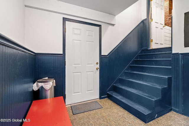 9 Longwood Dr, Saratoga Springs, Inside, NY 12866 - stairway with a wainscoted wall and carpet floors
