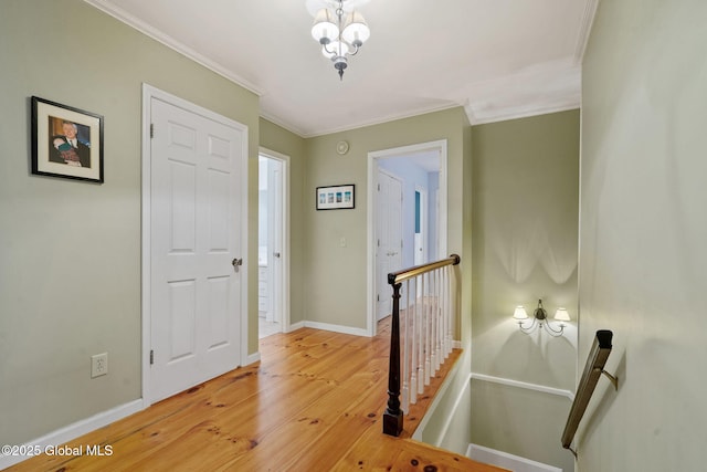 9 Longwood Dr, Saratoga Springs, Inside, NY 12866 - hallway featuring an upstairs landing, light wood-style flooring, and ornamental molding