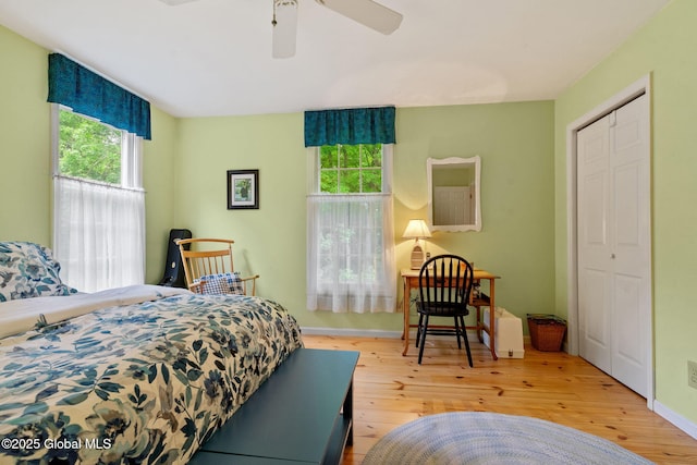 9 Longwood Dr, Saratoga Springs, Inside, NY 12866 - bedroom featuring multiple windows, hardwood / wood-style flooring, a closet, and ceiling fan