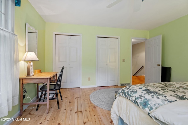 9 Longwood Dr, Saratoga Springs, Inside, NY 12866 - bedroom featuring multiple closets, light wood-type flooring, and a ceiling fan