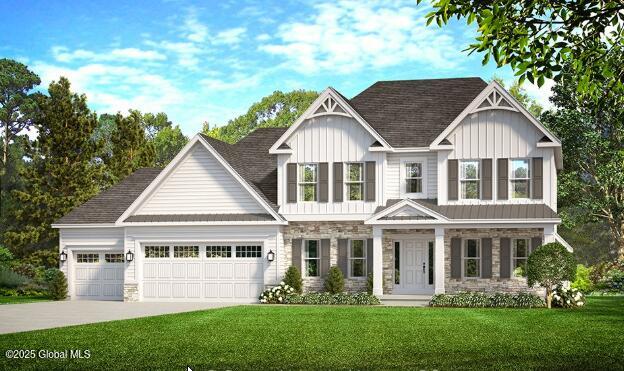 L-18 Van Patten Dr, Clifton Park, NY 12148 - craftsman house with stone siding, a front yard, and an attached garage