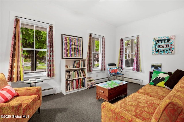32 Main St, Lake Luzerne, NY 12846 - living area featuring a baseboard radiator, ornamental molding, healthy amount of natural light, carpet flooring, and a baseboard heating unit