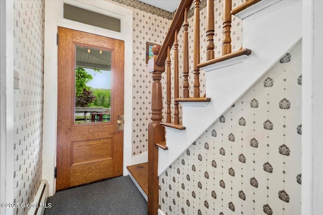 32 Main St, Lake Luzerne, NY 12846 - carpeted foyer entrance with a baseboard radiator